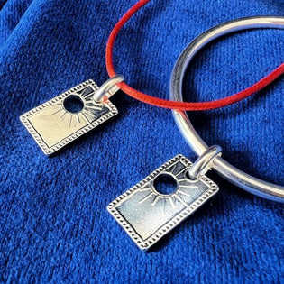 Utilisation et signification du pendentif Soleil en bijouterie