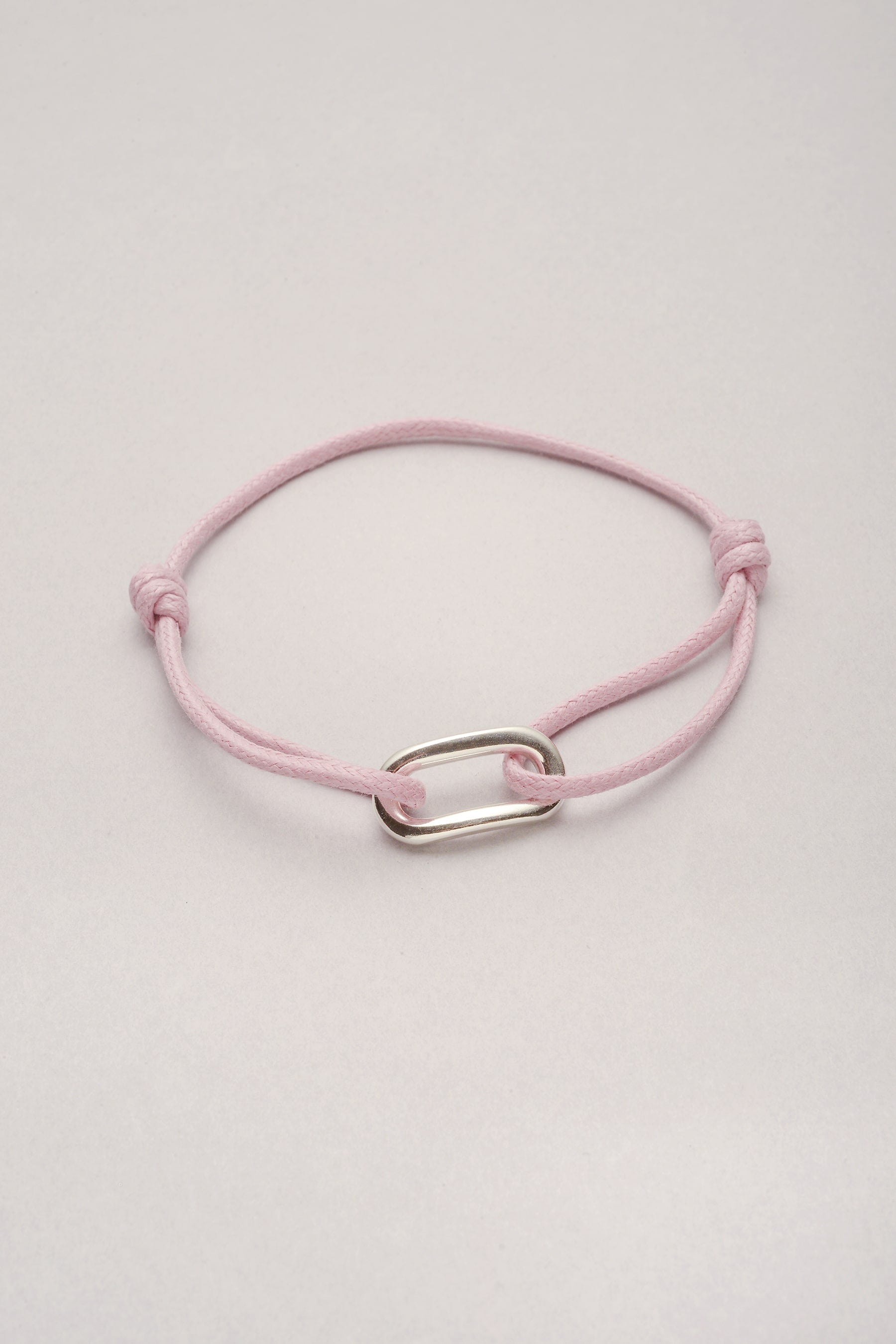 Bracelet avec pendentif arrondi mixte. Bijou personnalisable et réglable. Bracelet homme, bracelet femme, bracelet couple. 