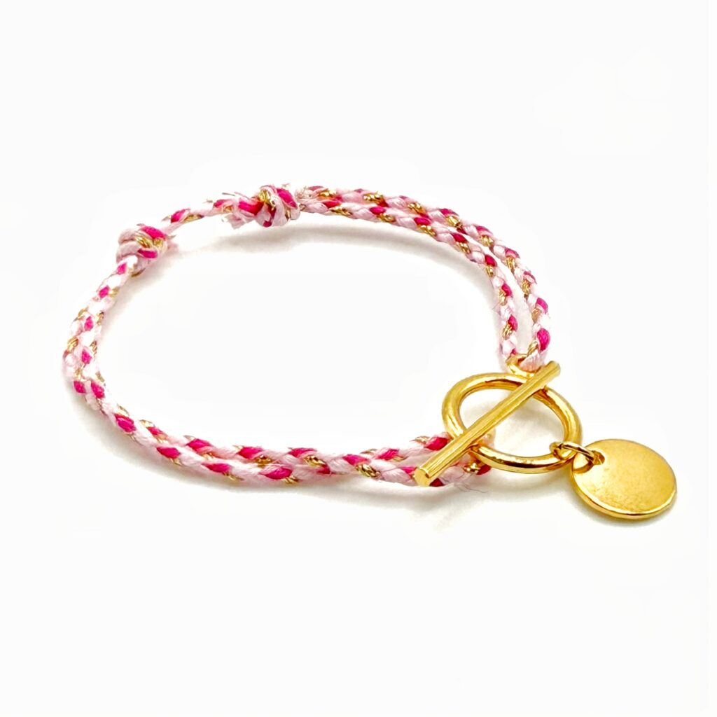 Bracelet lou doré médaille tressé cordon rose