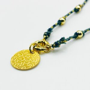 Collier doré léopard tressé cordon bleu