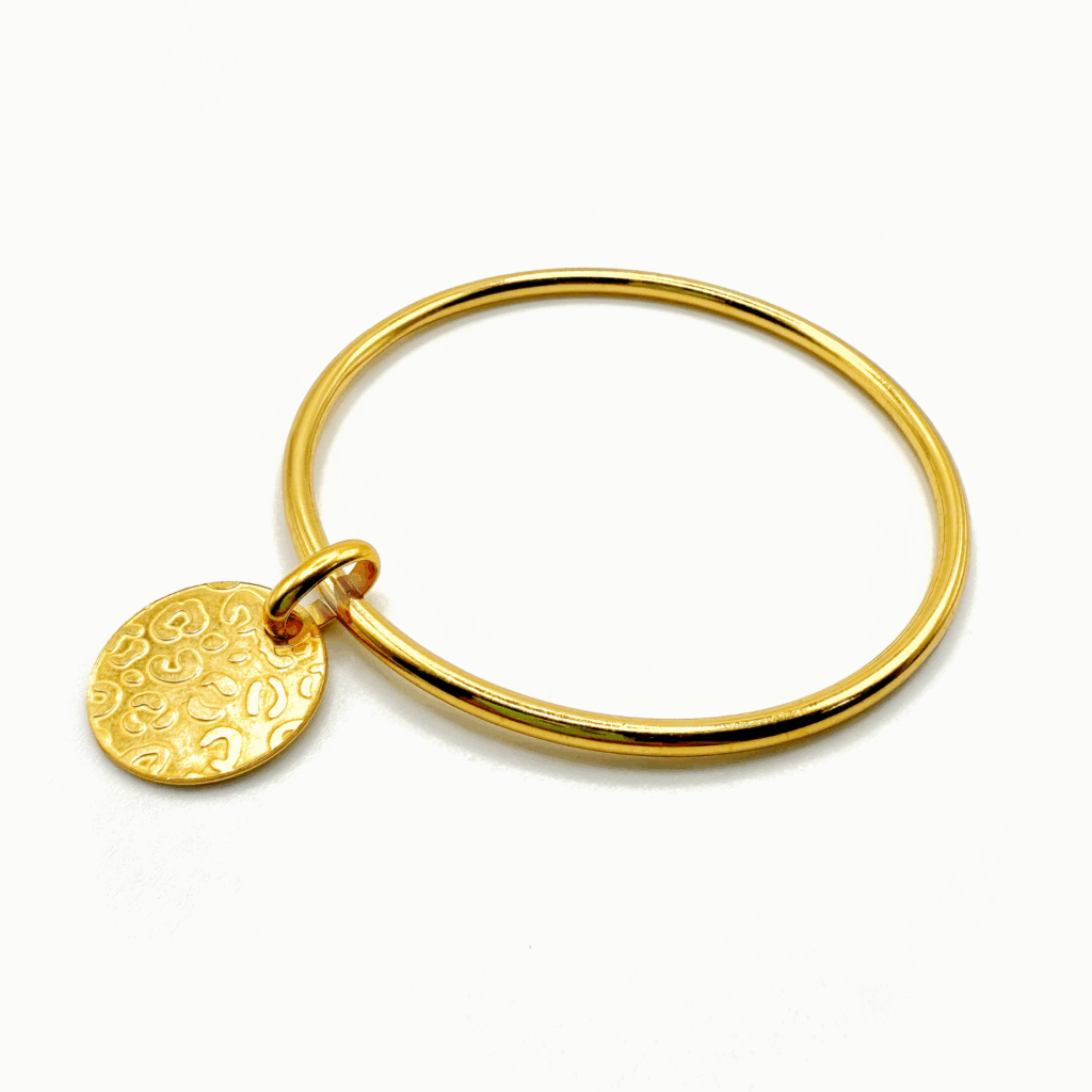 Jonc médaille léopard doré