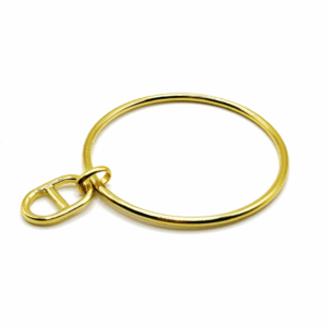 Jonc doré avec une jolie pampille maille marine dorée