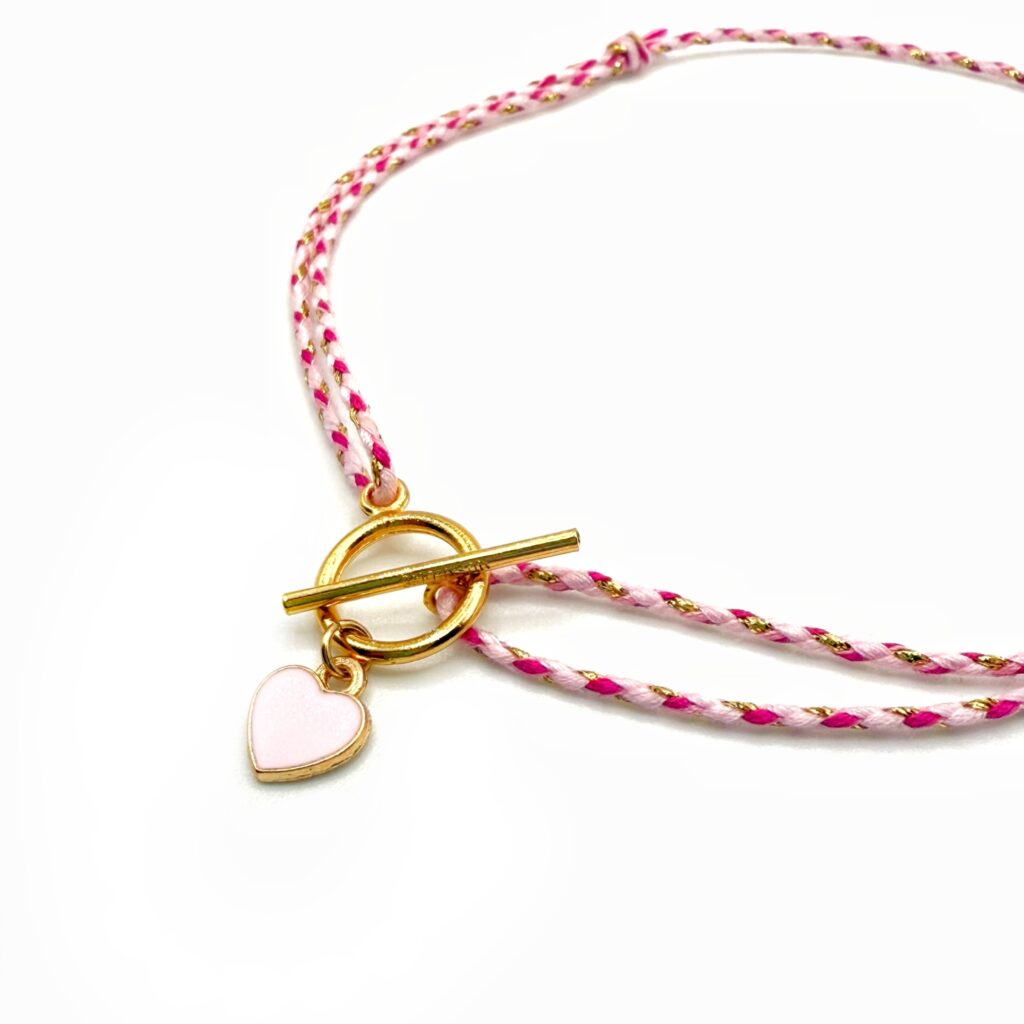 Collier Lou tressé coeur coloré cordon rose pâle
